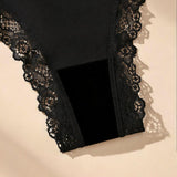 Sada 5 černých bavlněných kalhotek thong s krajkovými detaily a jemnou mašlí. Minimalistický, bezešvý design.